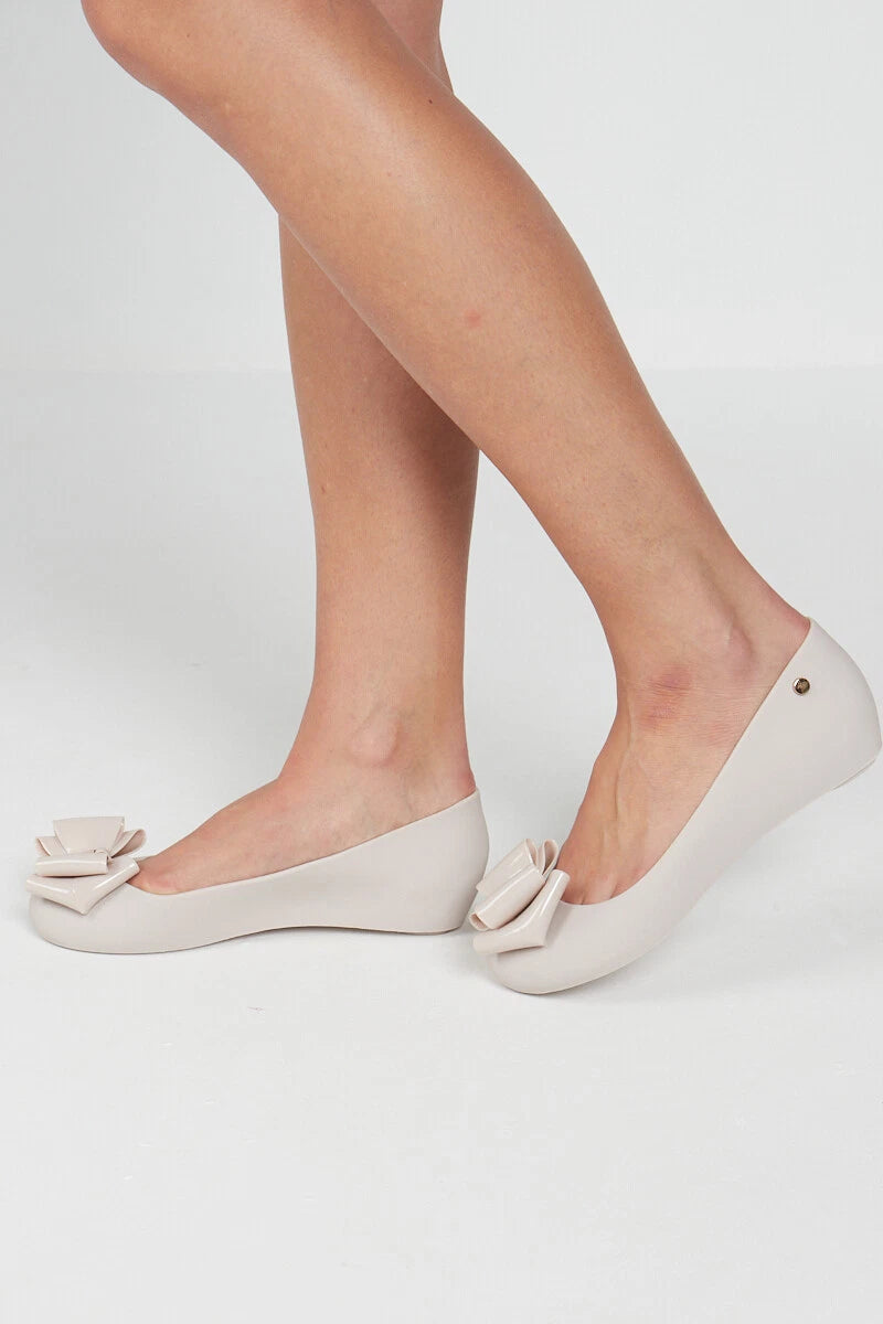 Jada Ladies Slip-On Women's Jelly Flats with Peep Toe and Bow Detail