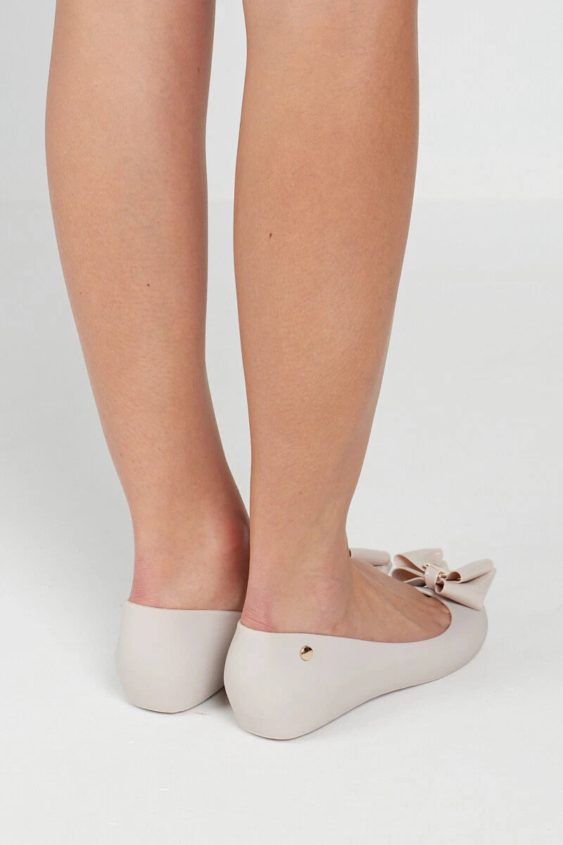Jada Ladies Slip-On Women's Jelly Flats with Peep Toe and Bow Detail