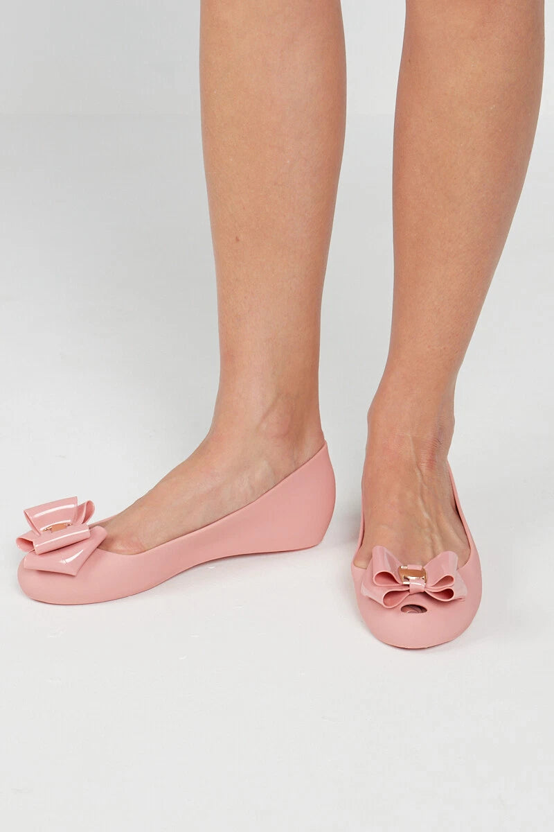 Jada Ladies Slip-On Women's Jelly Flats with Peep Toe and Bow Detail