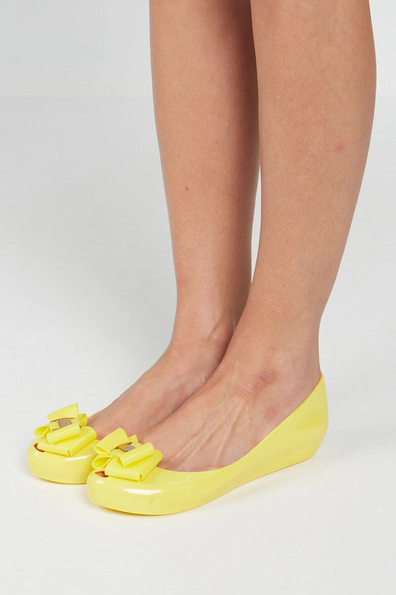 Jada Ladies Slip-On Women's Jelly Flats with Peep Toe and Bow Detail